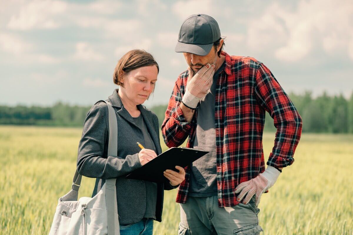 photo of tax advisor helping a farmer